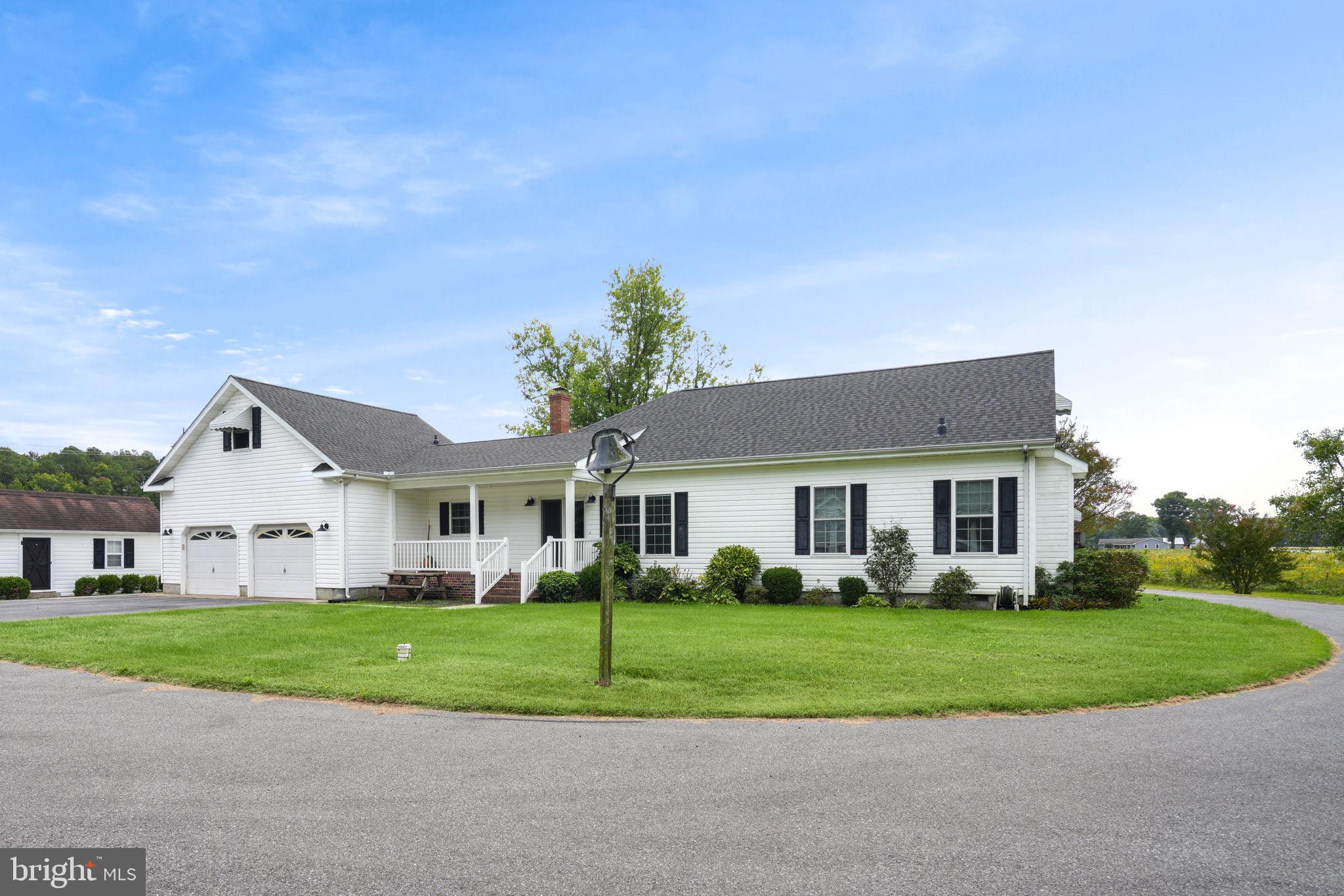 9449 Carey Road Berlin, MD 21811 - Photo 102 of 108 a front view of house with yard and green space
