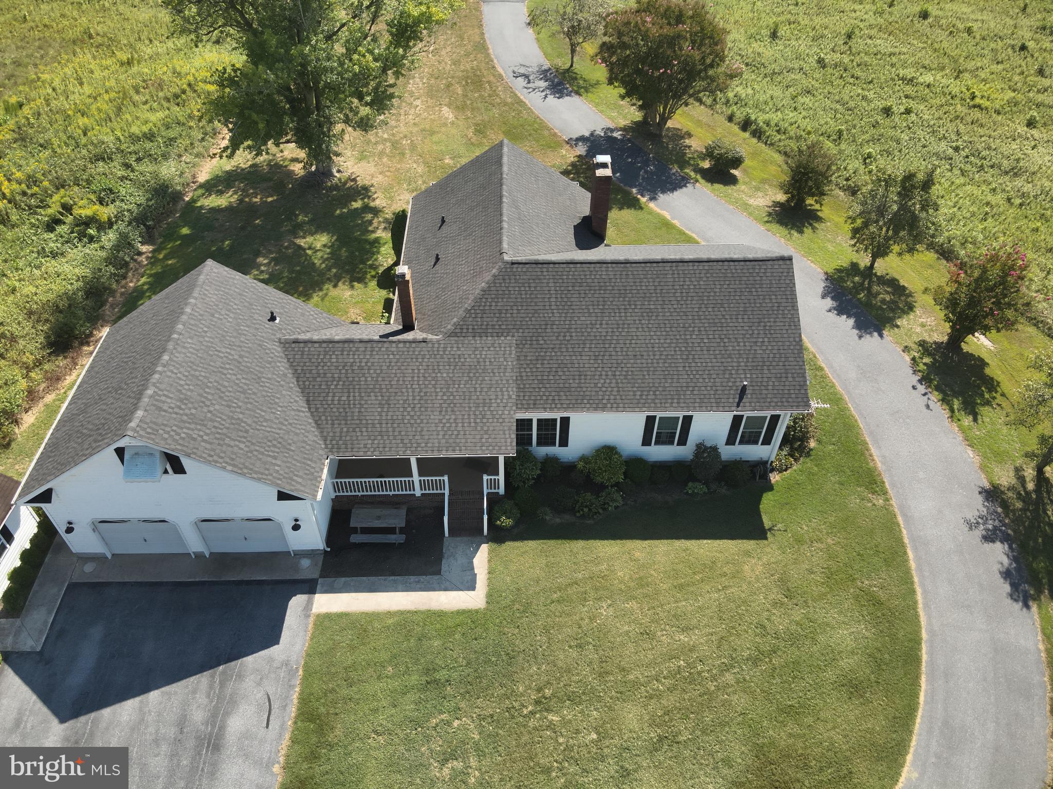 9449 Carey Road Berlin, MD 21811 - Photo 23 of 108 an aerial view of a house with swimming pool