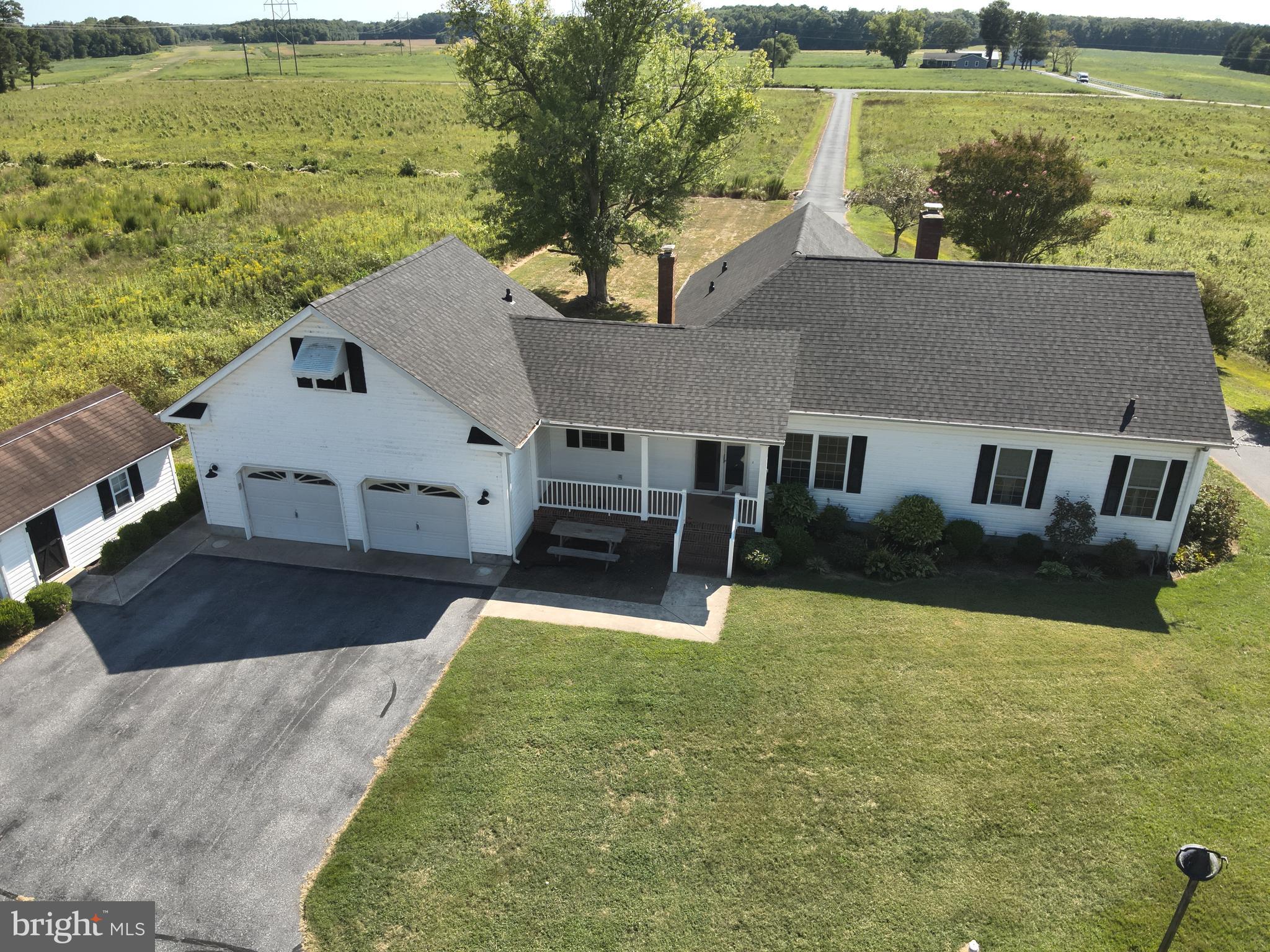 9449 Carey Road Berlin, MD 21811 - Photo 27 of 108 a aerial view of a house next to a yard with an outdoor seating