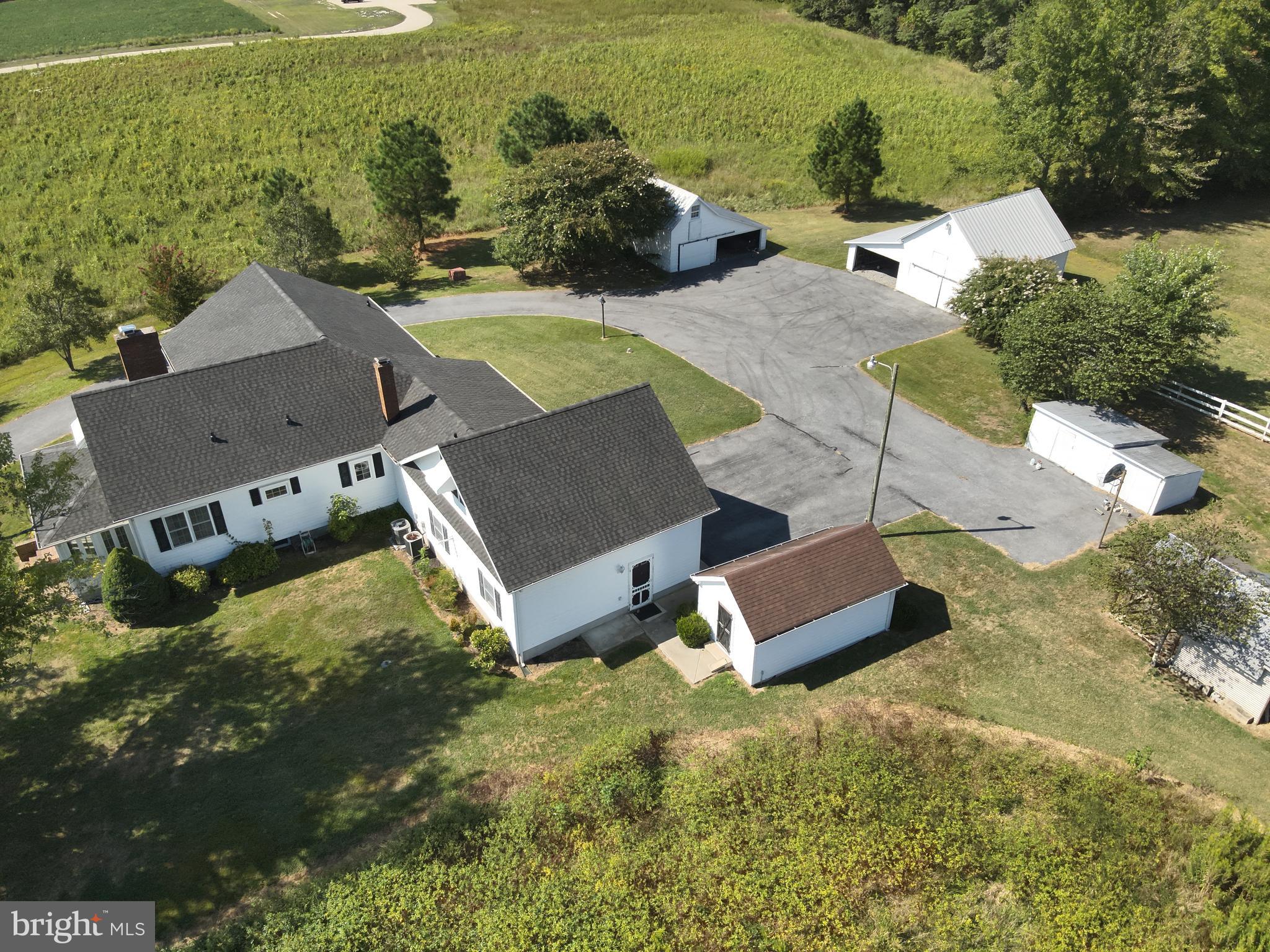 9449 Carey Road Berlin, MD 21811 - Photo 29 of 108 an aerial view of a house with a garden