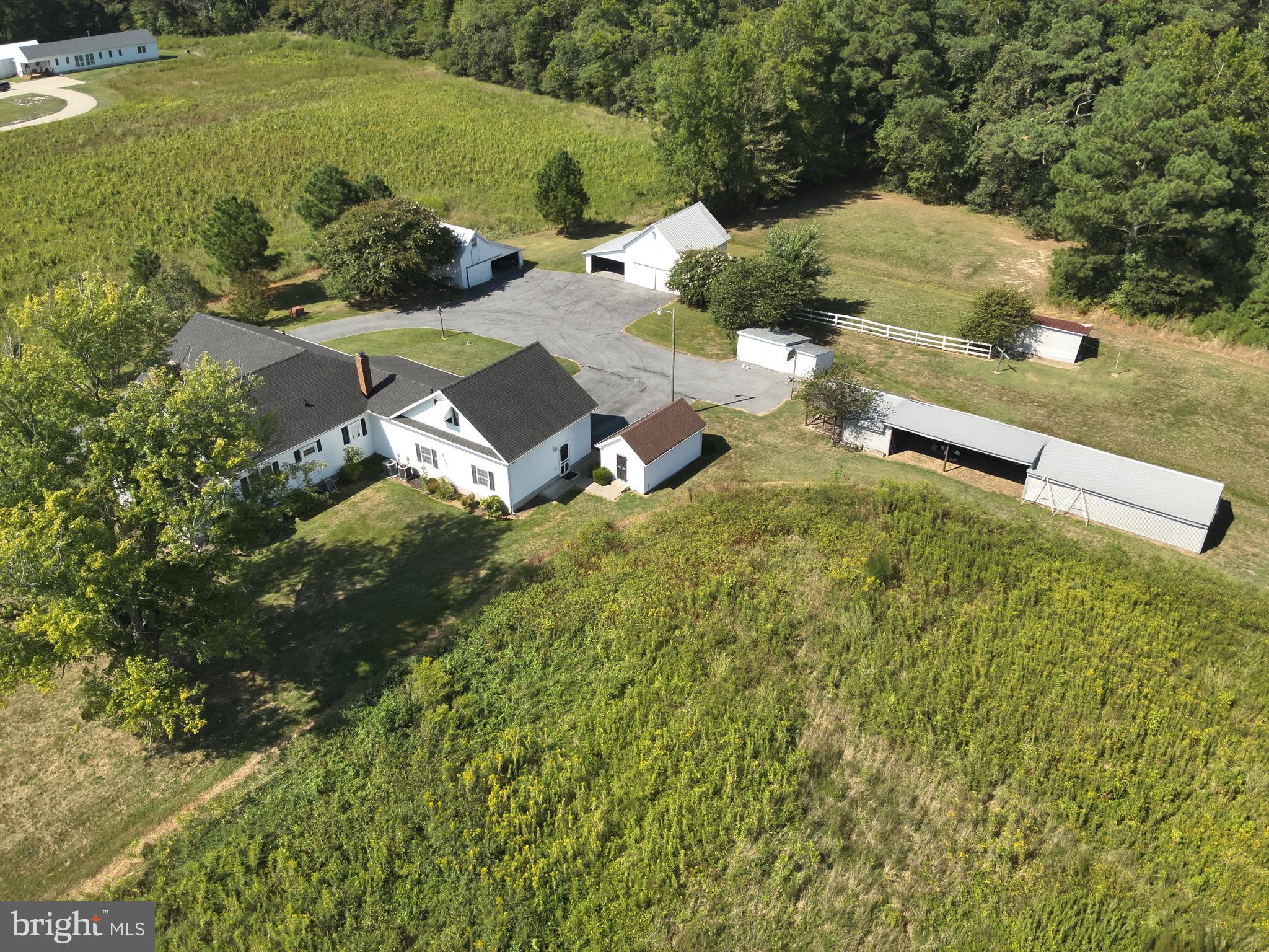 9449 Carey Road Berlin, MD 21811 - Photo 31 of 108 an aerial view of a house with a yard