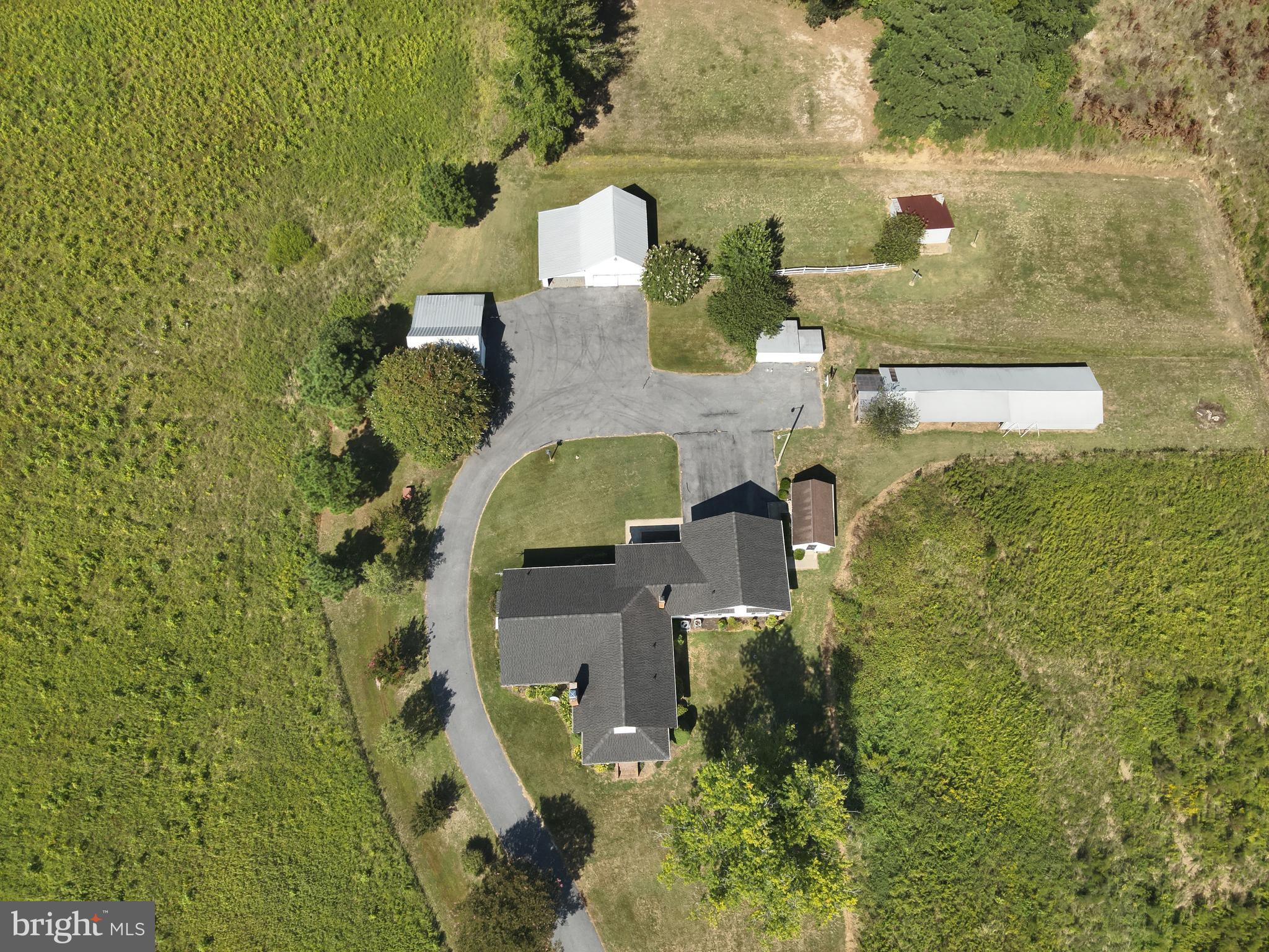 9449 Carey Road Berlin, MD 21811 - Photo 34 of 108 an aerial view of residential house with outdoor space and parking