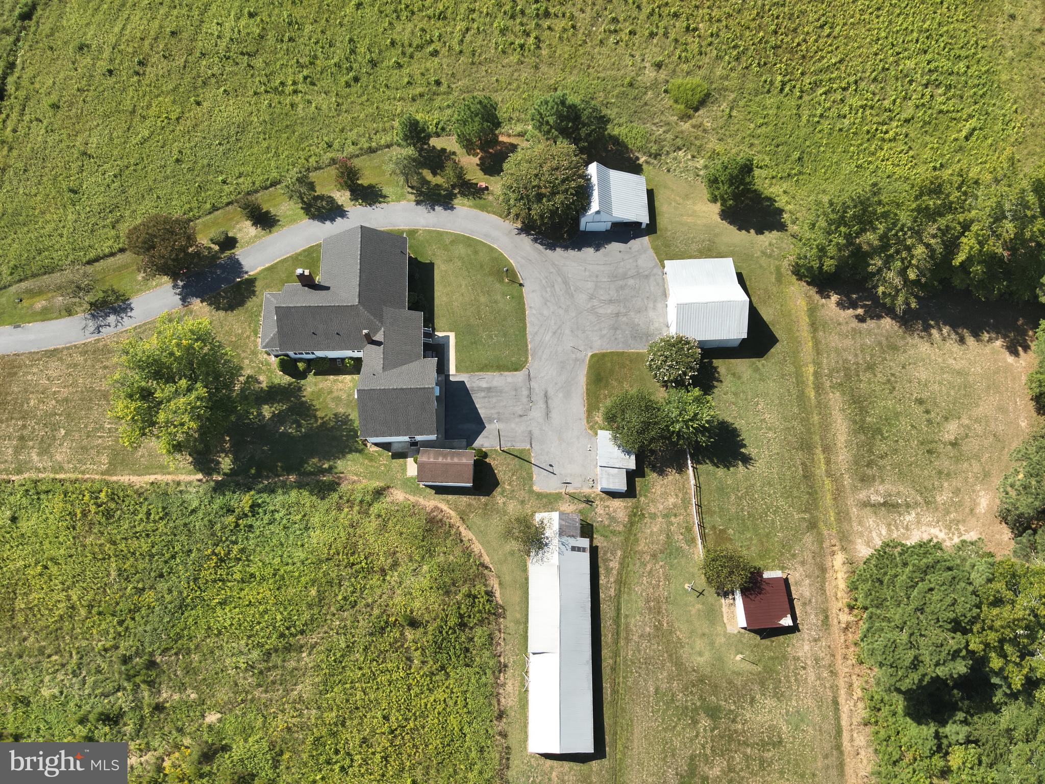 9449 Carey Road Berlin, MD 21811 - Photo 36 of 108 an aerial view of a house with a yard