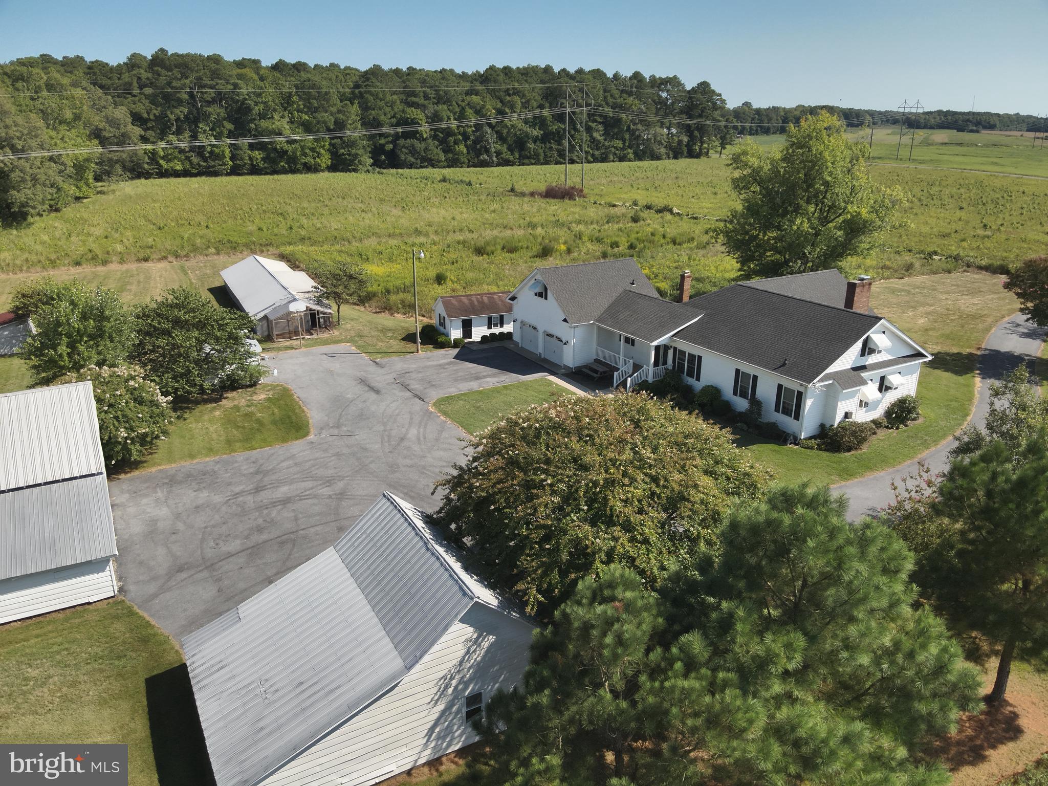 9449 Carey Road Berlin, MD 21811 - Photo 47 of 108 an aerial view of a house with garden space and outdoor seating