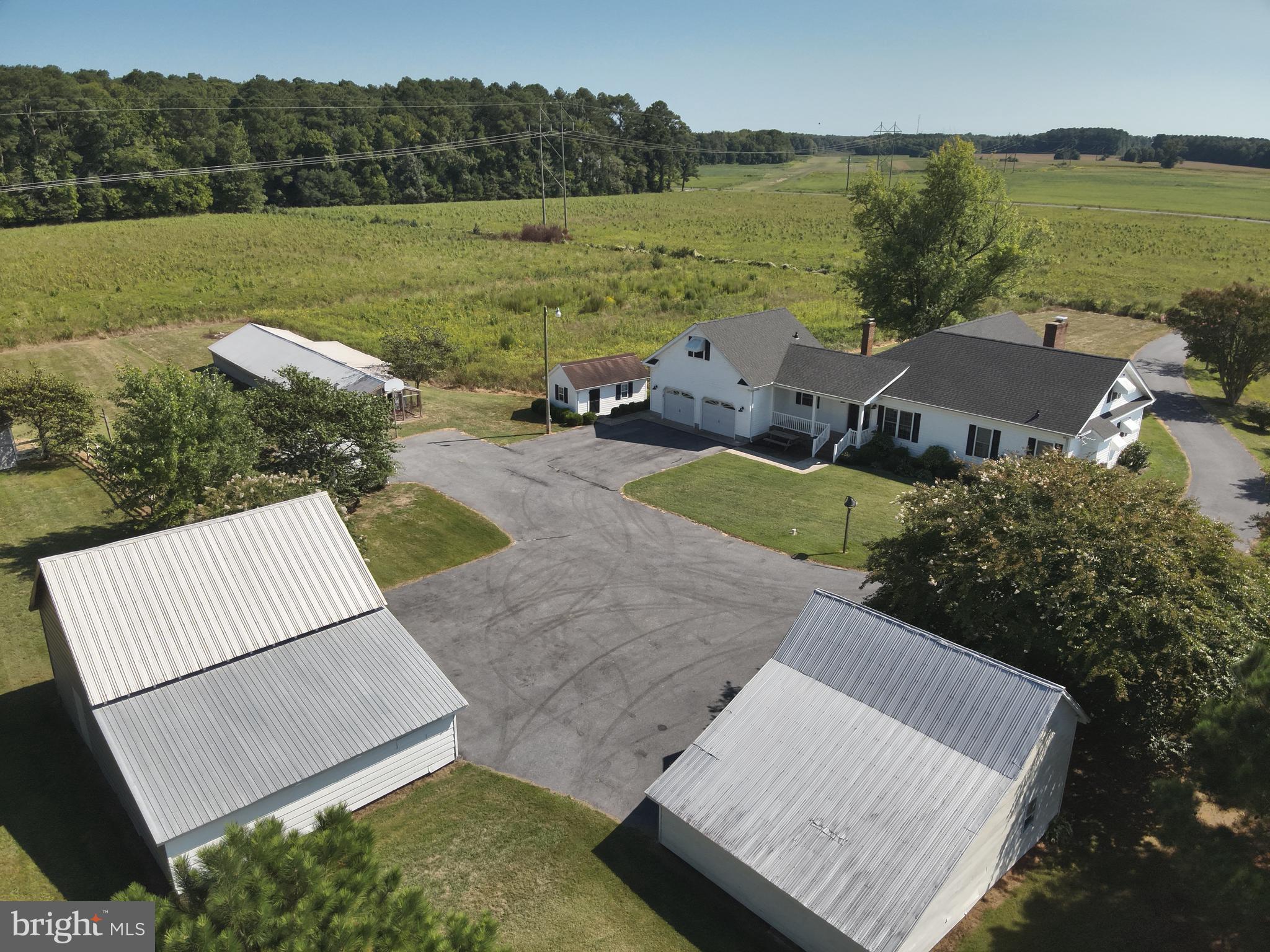 9449 Carey Road Berlin, MD 21811 - Photo 48 of 108 an aerial view of a house with garden space and outdoor seating