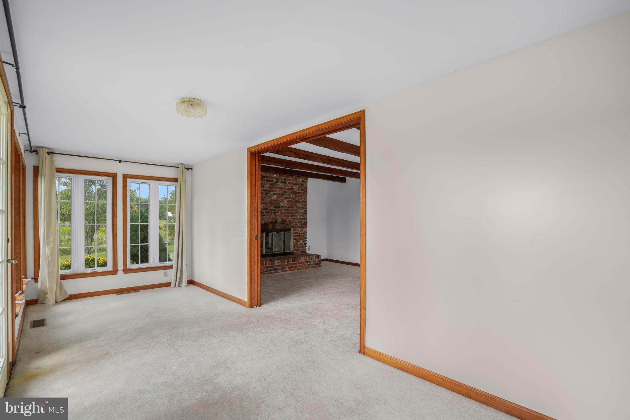 9449 Carey Road Berlin, MD 21811 - Photo 62 of 108 a view of an empty room with a window