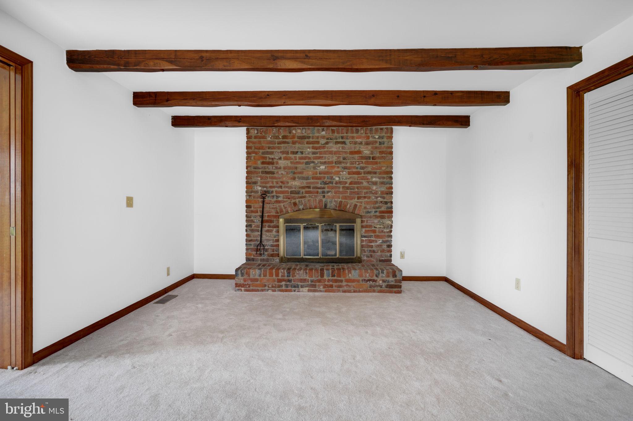 9449 Carey Road Berlin, MD 21811 - Photo 64 of 108 a view of empty room with a fireplace