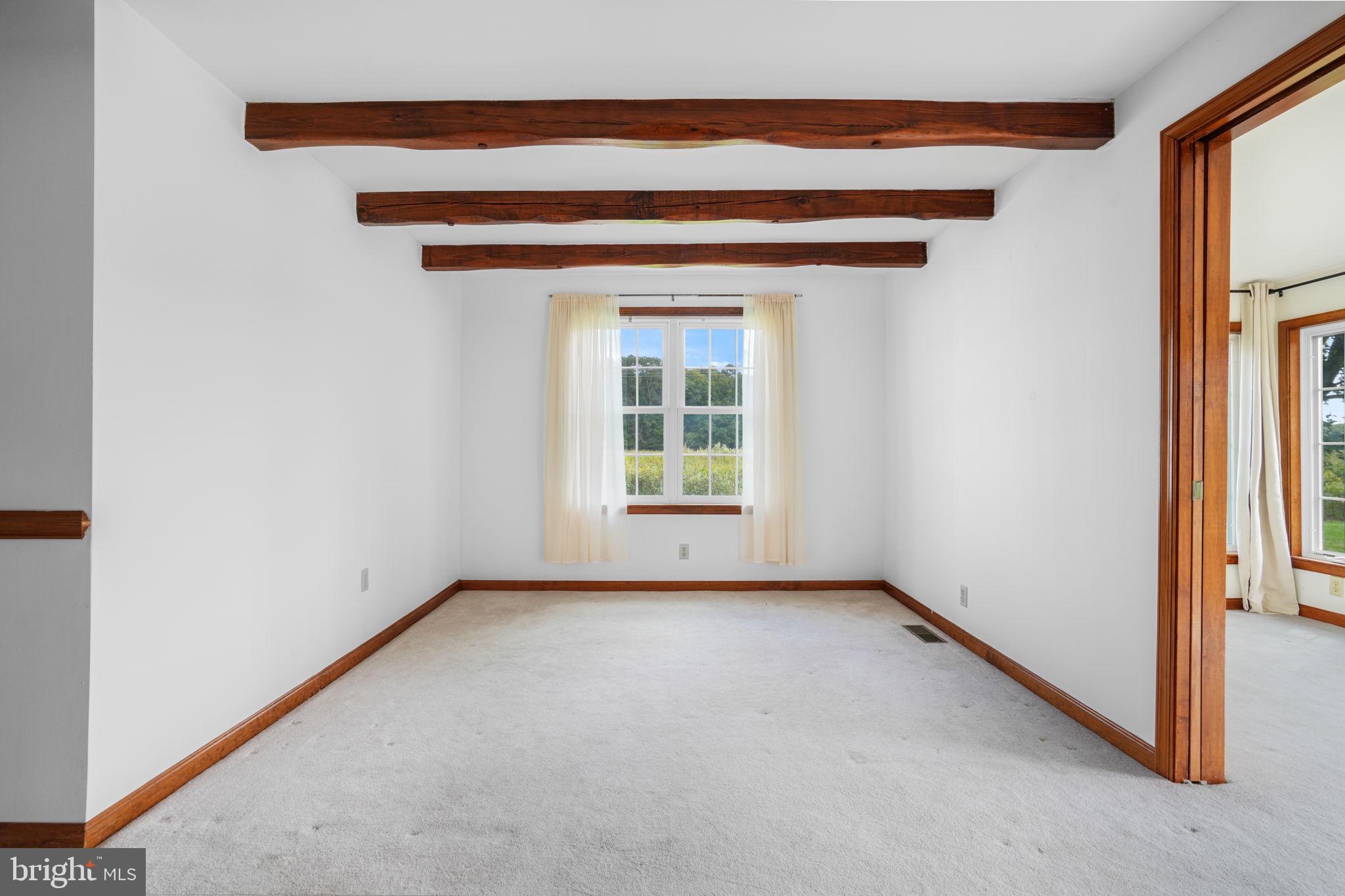 9449 Carey Road Berlin, MD 21811 - Photo 66 of 108 a view of an empty room with a window