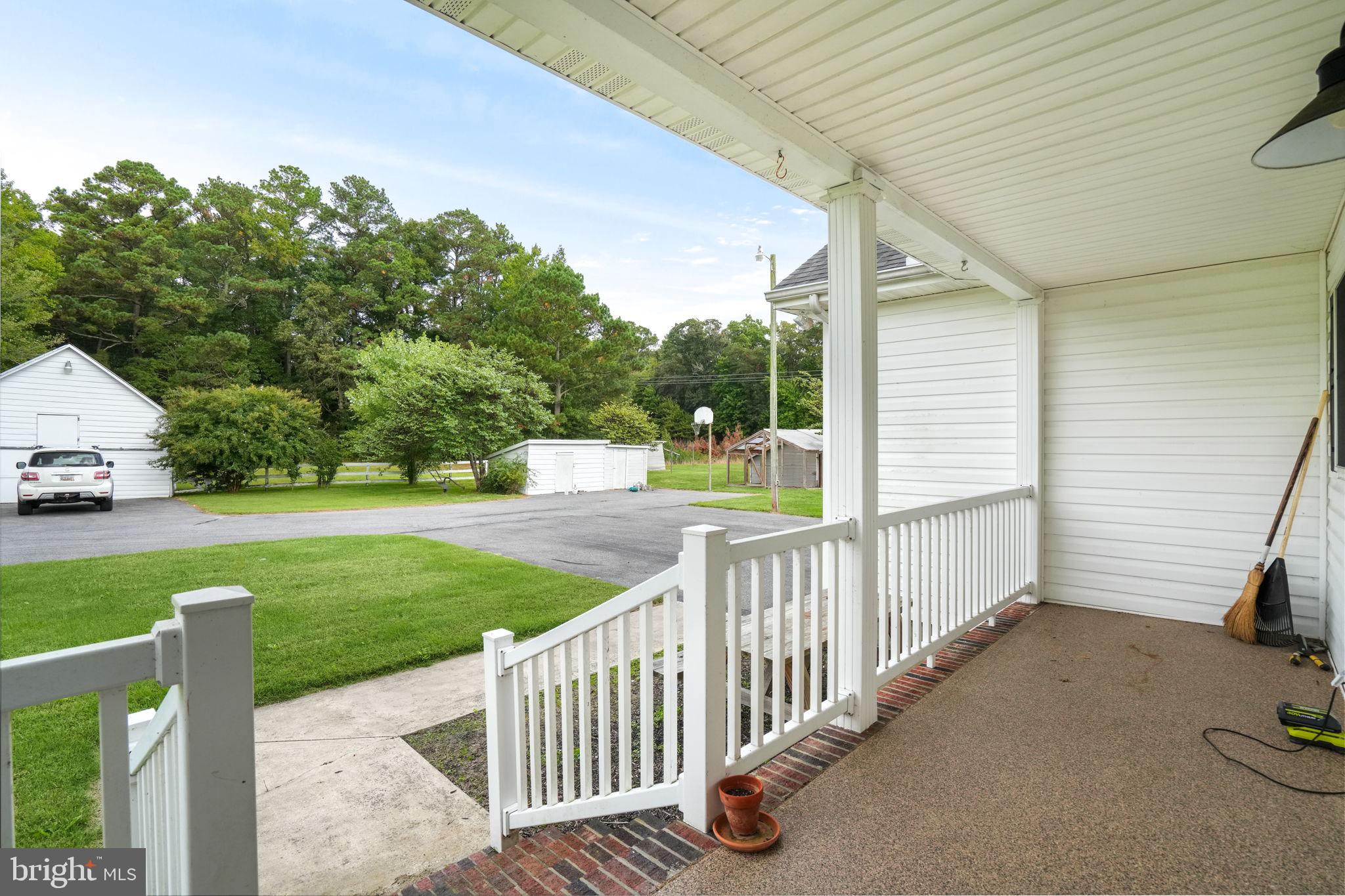 9449 Carey Road Berlin, MD 21811 - Photo 98 of 108 a view of a porch with garden