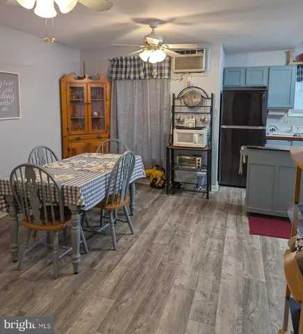 a bedroom with furniture and a chandelier