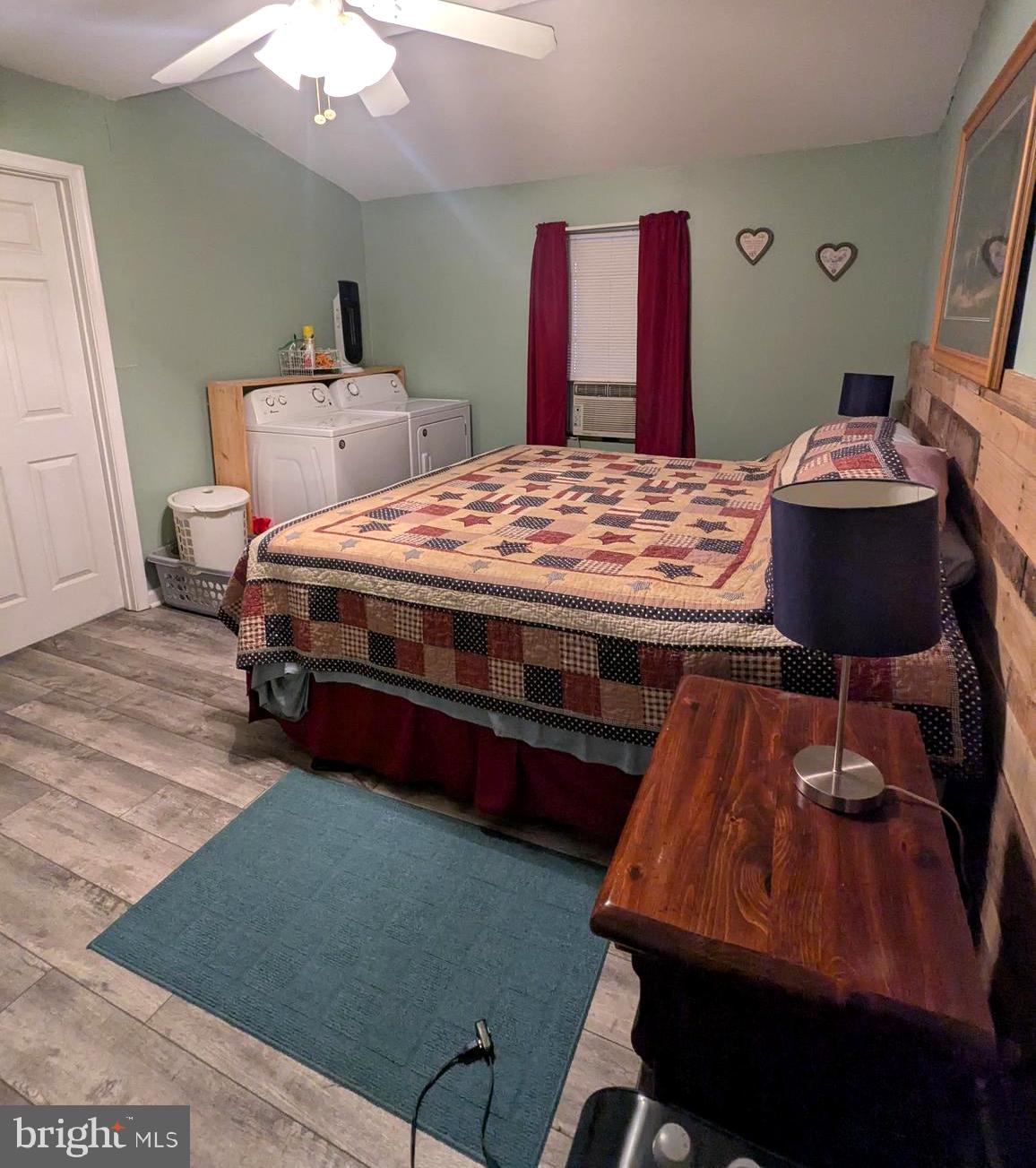 1 Ranger Road Falling Waters, WV 25419 - Photo 21 of 25 a bed sitting in a room next to a window