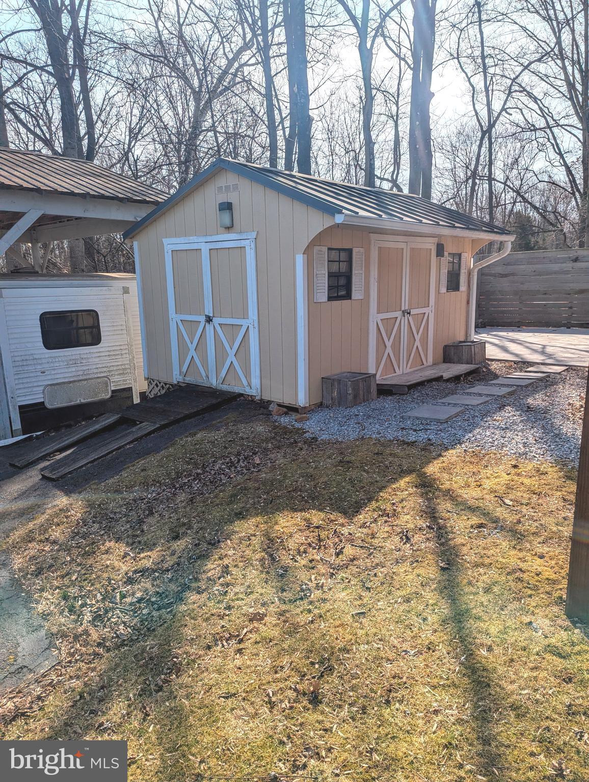 1 Ranger Road Falling Waters, WV 25419 - Photo 3 of 25 a view of a grey house with a yard