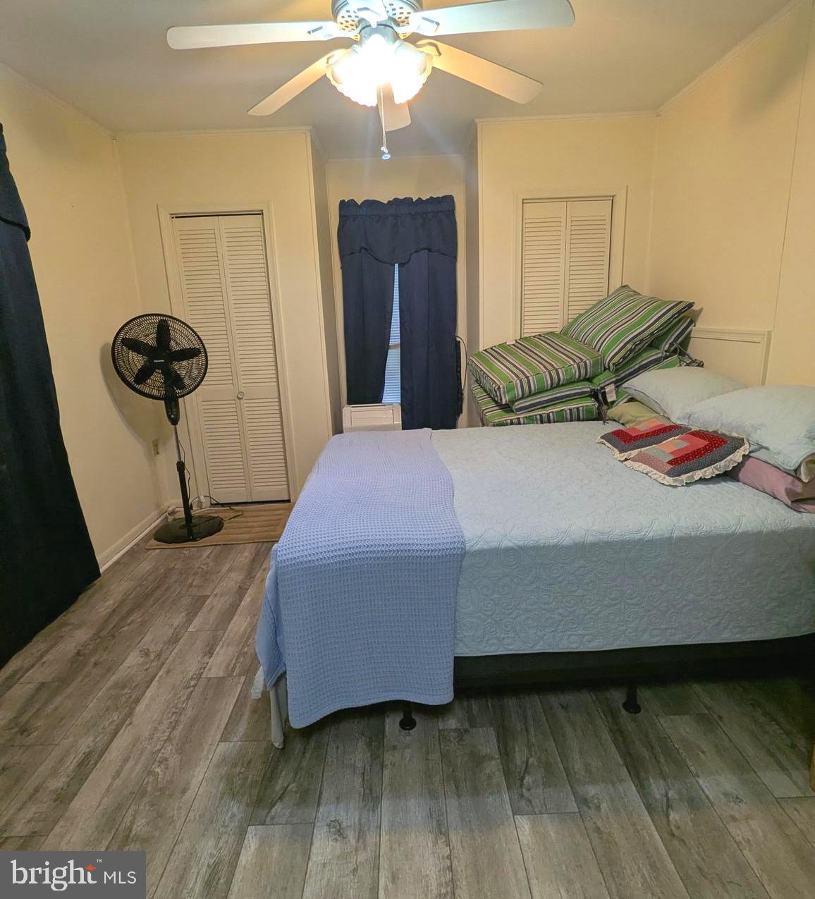 1 Ranger Road Falling Waters, WV 25419 - Photo 5 of 25 a bedroom with a bed and wooden floor