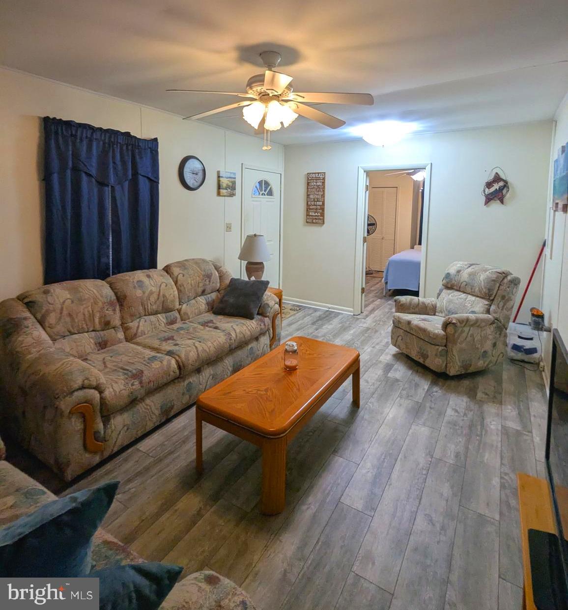 1 Ranger Road Falling Waters, WV 25419 - Photo 10 of 25 a living room with furniture and a wooden floor