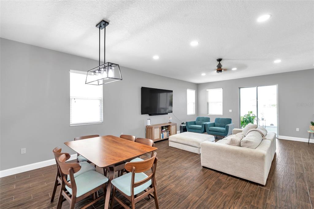 7523 Tangle Brook Boulevard Gibsonton, FL 33534 - Photo 13 of 35 a living room with furniture and a flat screen tv
