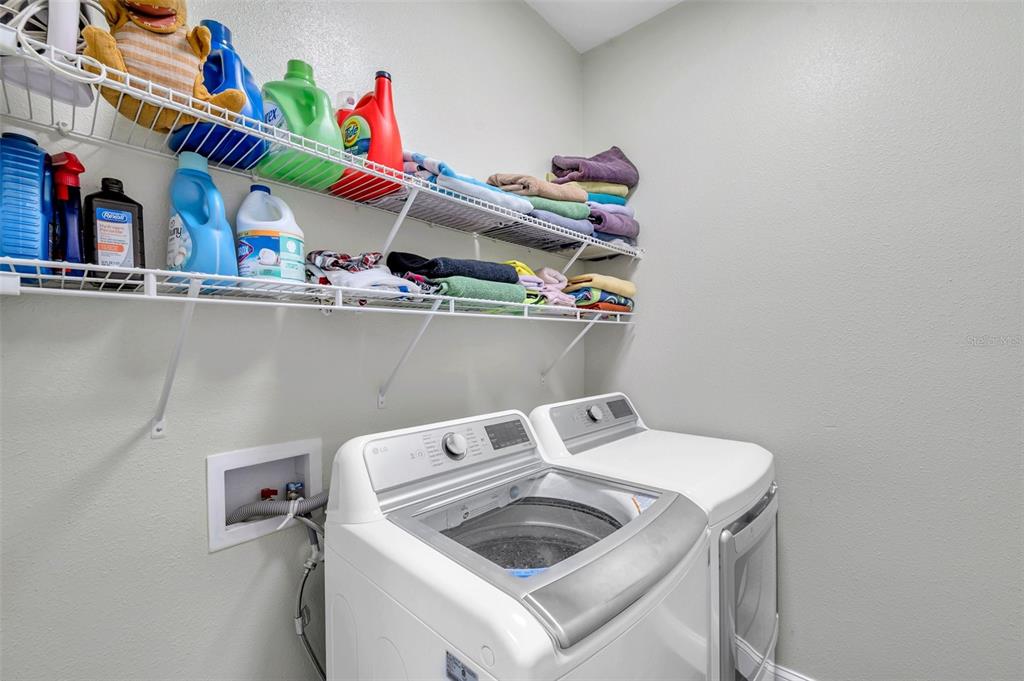 7523 Tangle Brook Boulevard Gibsonton, FL 33534 - Photo 27 of 35 a utility room with dryer and washer