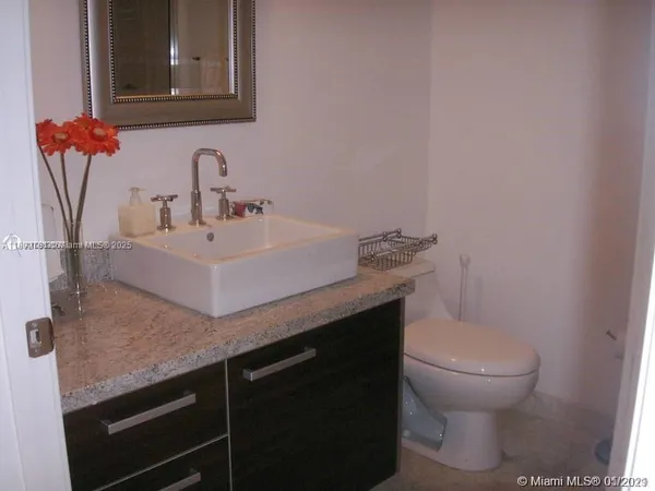 a bathroom with a sink and a toilet