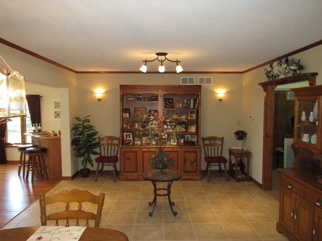 1027 West Kennedy Road Braidwood, IL 60408 - Photo 26 of 55 a view of a livingroom with furniture and a window