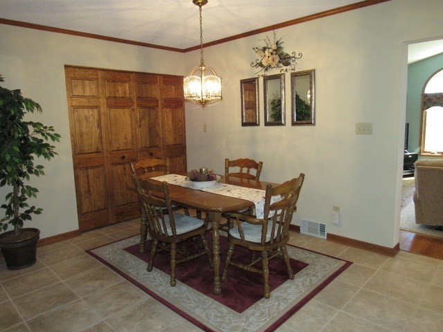 1027 West Kennedy Road Braidwood, IL 60408 - Photo 27 of 55 a view of a dining room with furniture and wooden floor