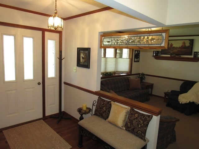 1027 West Kennedy Road Braidwood, IL 60408 - Photo 31 of 55 a living room with furniture and a flat screen tv