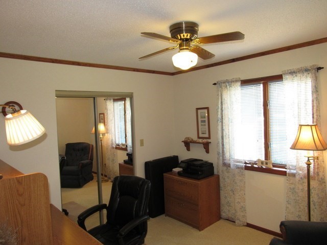 1027 West Kennedy Road Braidwood, IL 60408 - Photo 41 of 55 a living room with furniture and a window