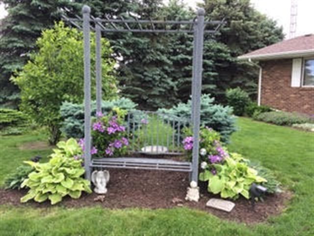 1027 West Kennedy Road Braidwood, IL 60408 - Photo 48 of 55 a bunch of flowers are in a garden