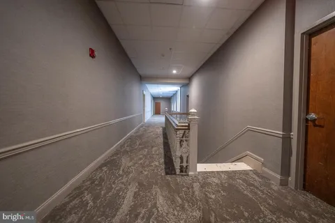 a view of a livingroom with wooden floor