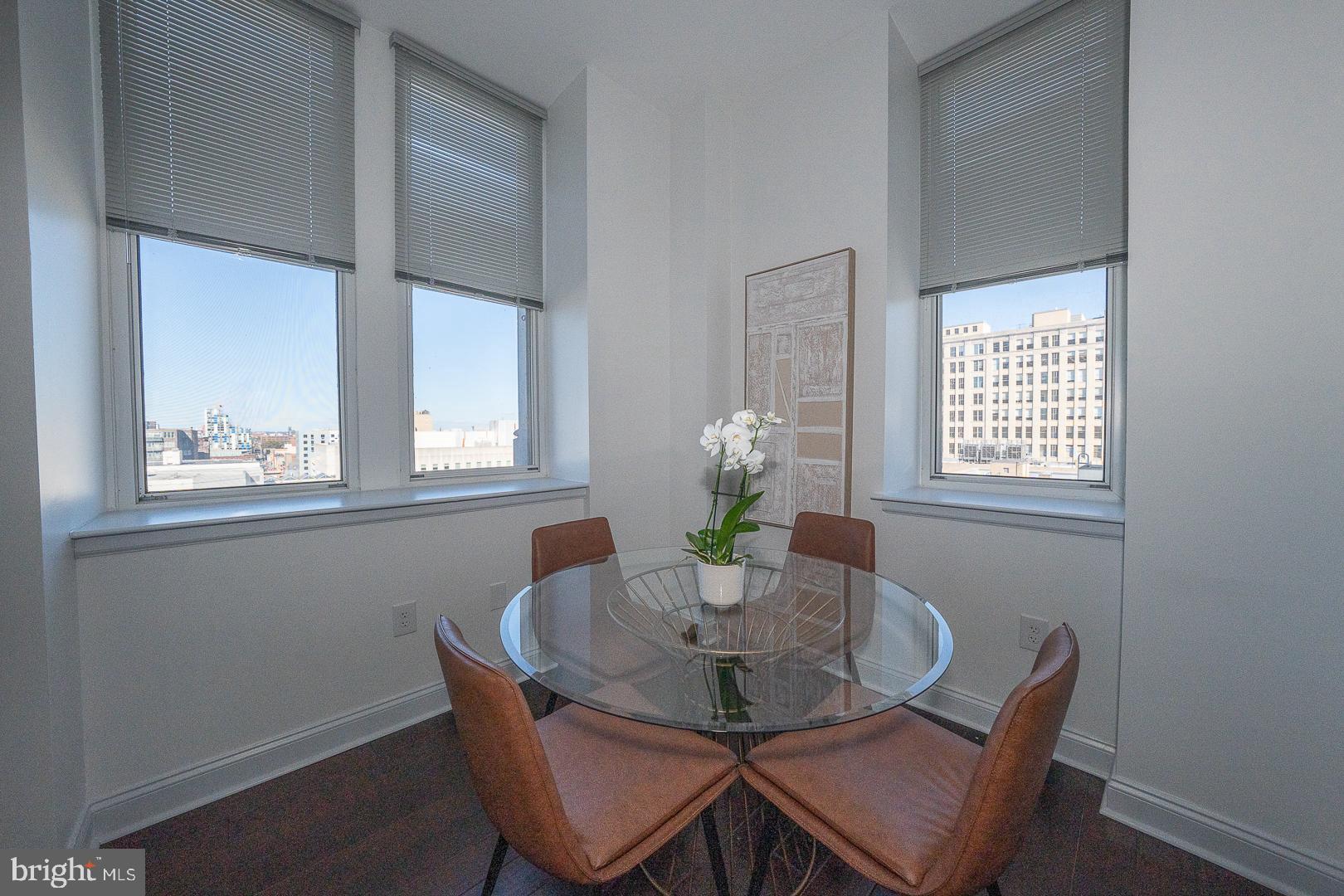 1001 Chestnut Street, Unit 705E Philadelphia, PA 19103 - Photo 21 of 36 a dining room with furniture and window