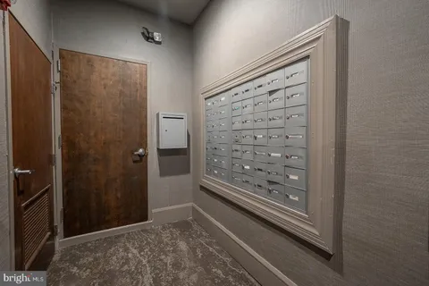 a view of wooden floor and closet