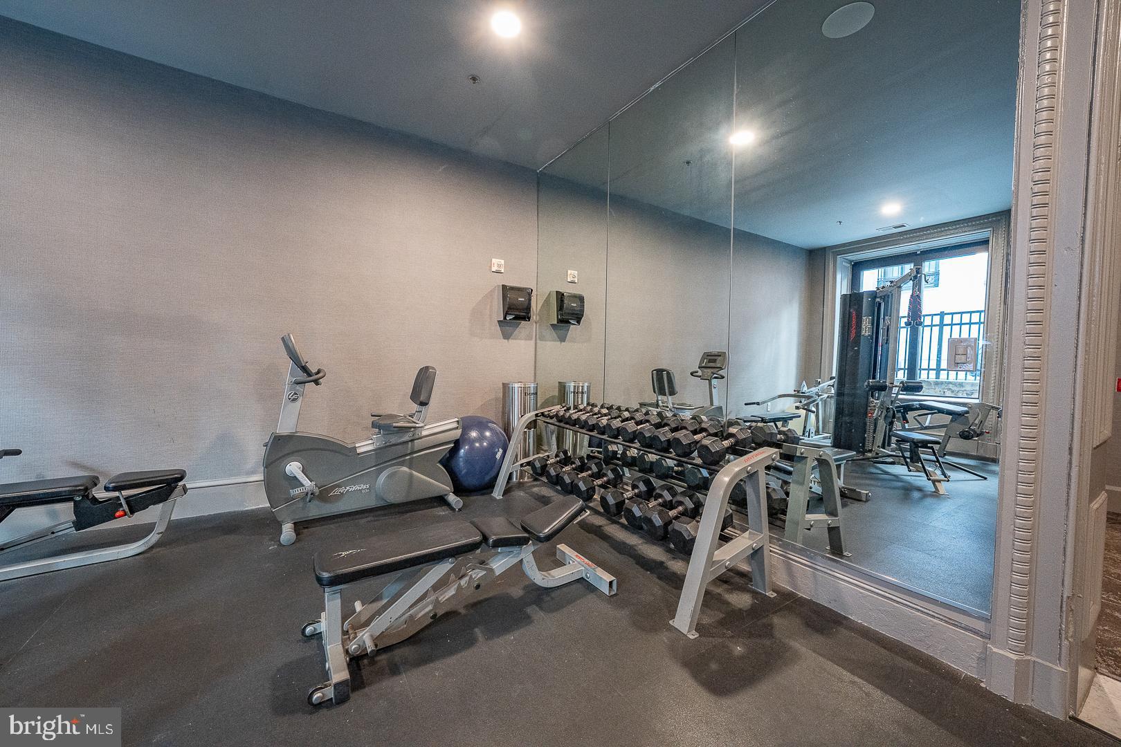 1001 Chestnut Street, Unit 705E Philadelphia, PA 19103 - Photo 7 of 36 a view of a room with gym equipment