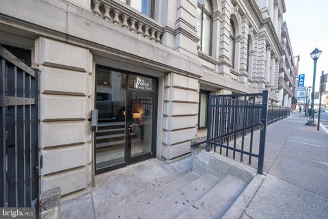 a view of a building with wooden stairs