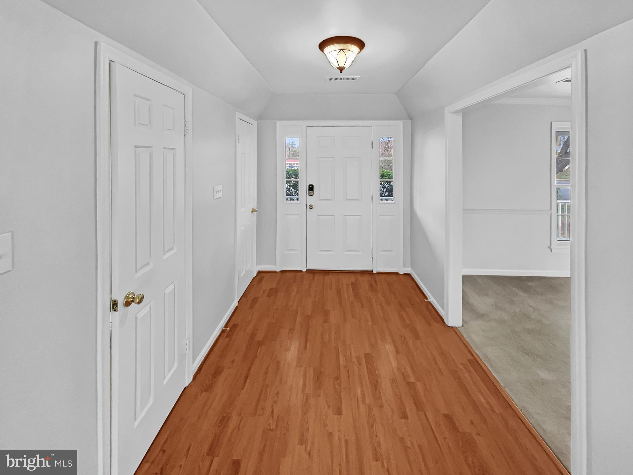 1624 Hiddenbrook Drive Herndon, VA 20170 - Photo 11 of 58 a view of a hallway with wooden floor