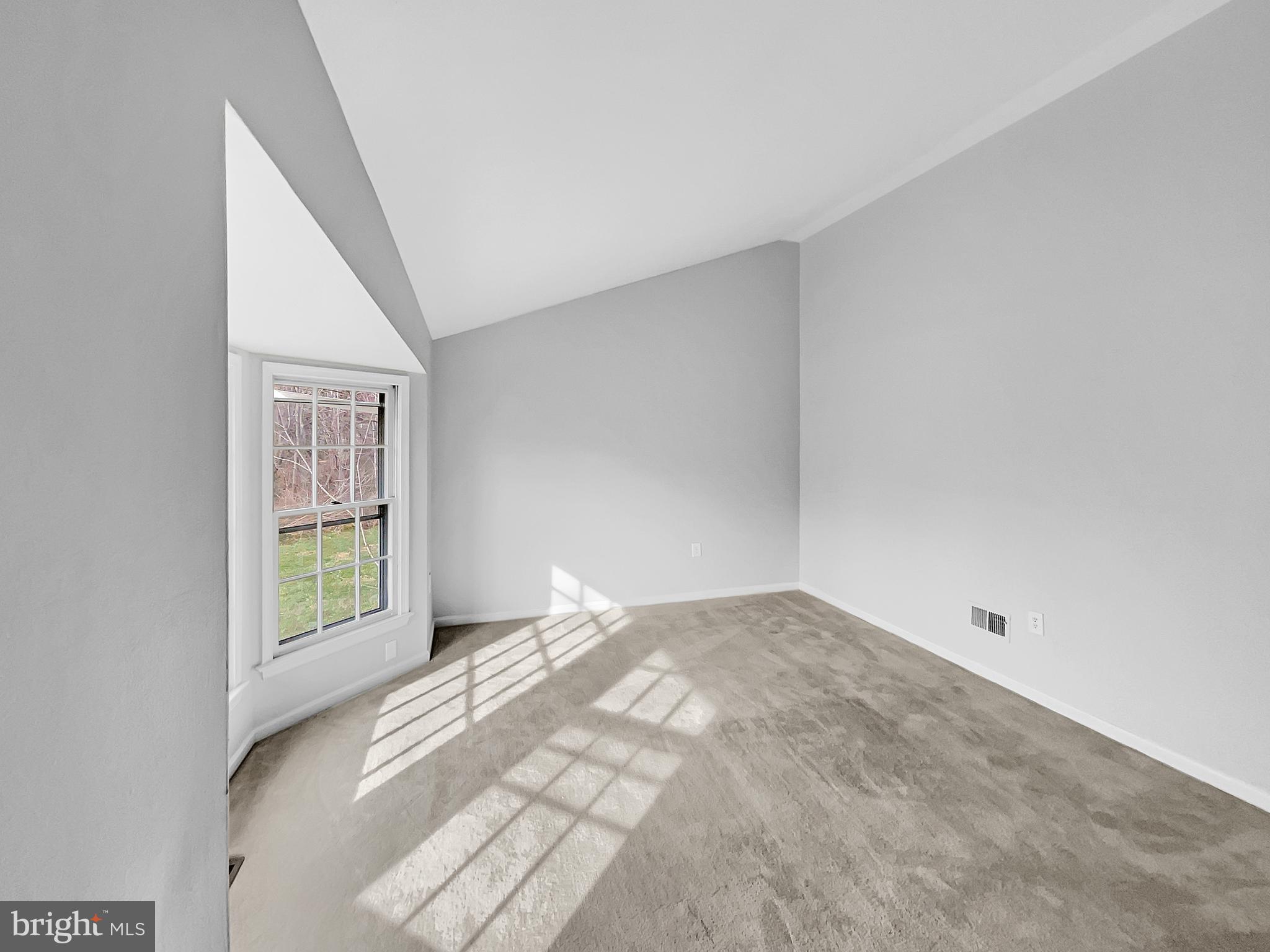 1624 Hiddenbrook Drive Herndon, VA 20170 - Photo 15 of 58 a view of an empty room with windows