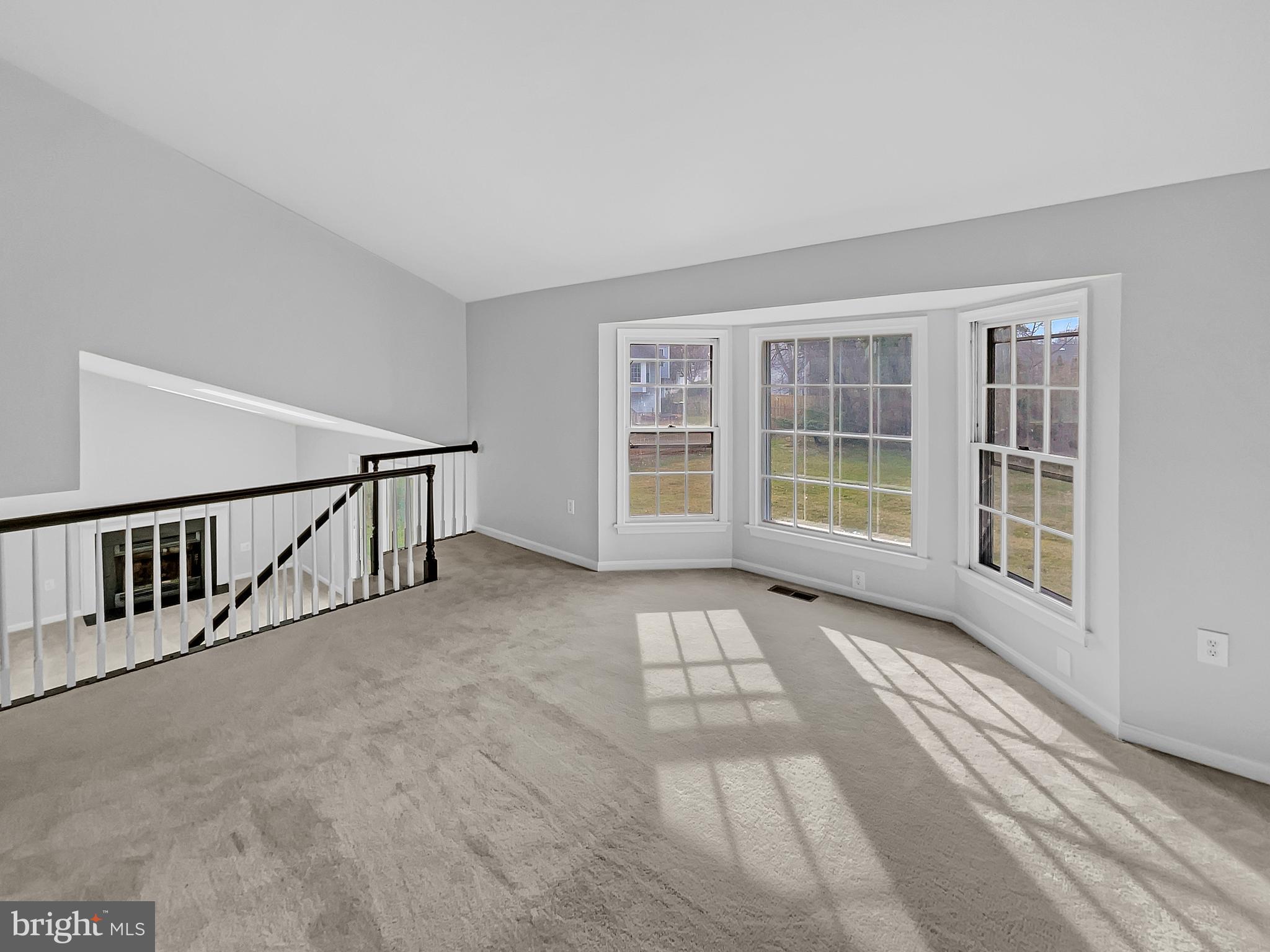 1624 Hiddenbrook Drive Herndon, VA 20170 - Photo 17 of 58 a view of an empty room with wooden floor and stairs