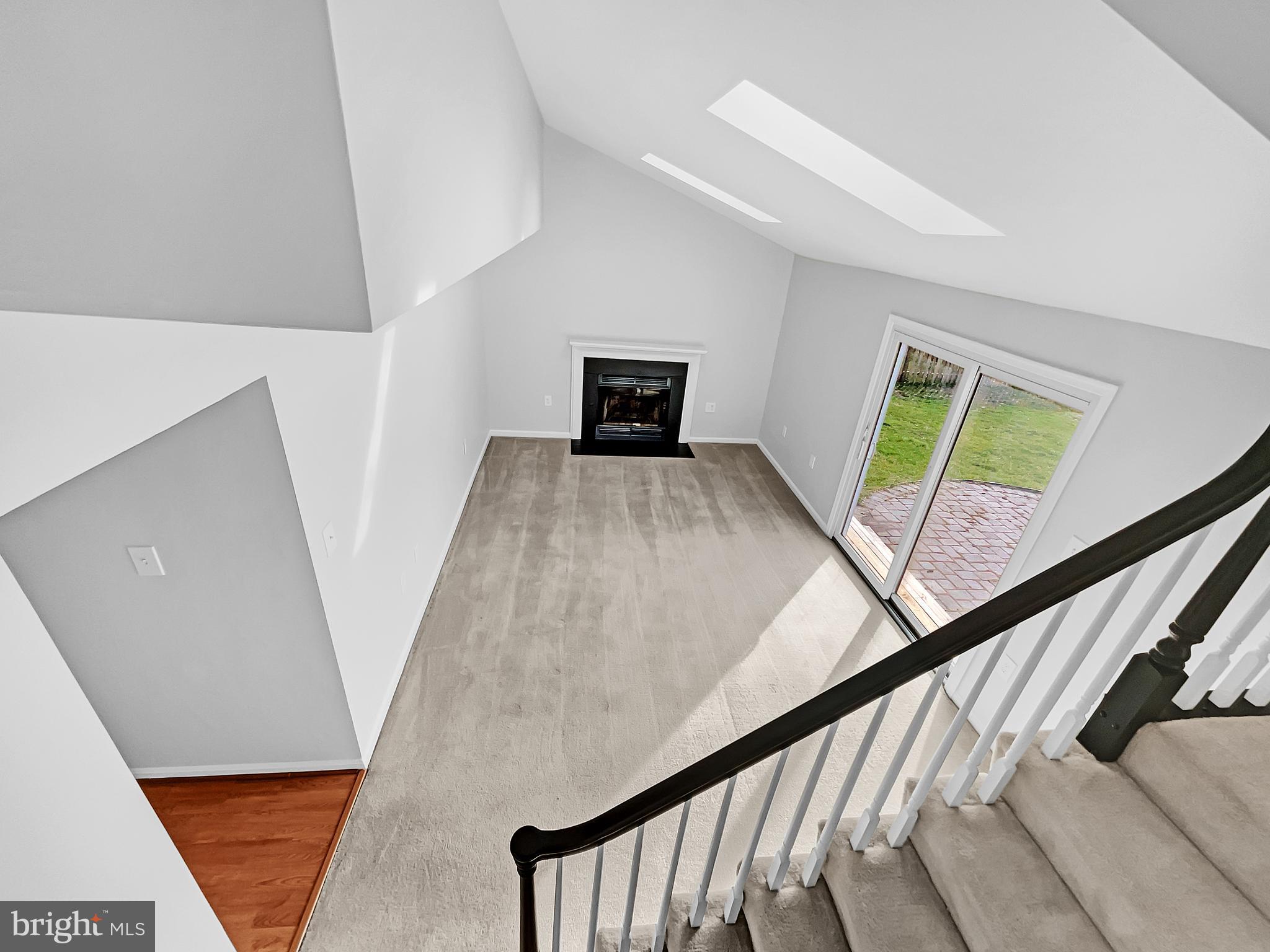 1624 Hiddenbrook Drive Herndon, VA 20170 - Photo 21 of 58 a view of staircase with white walls and railing