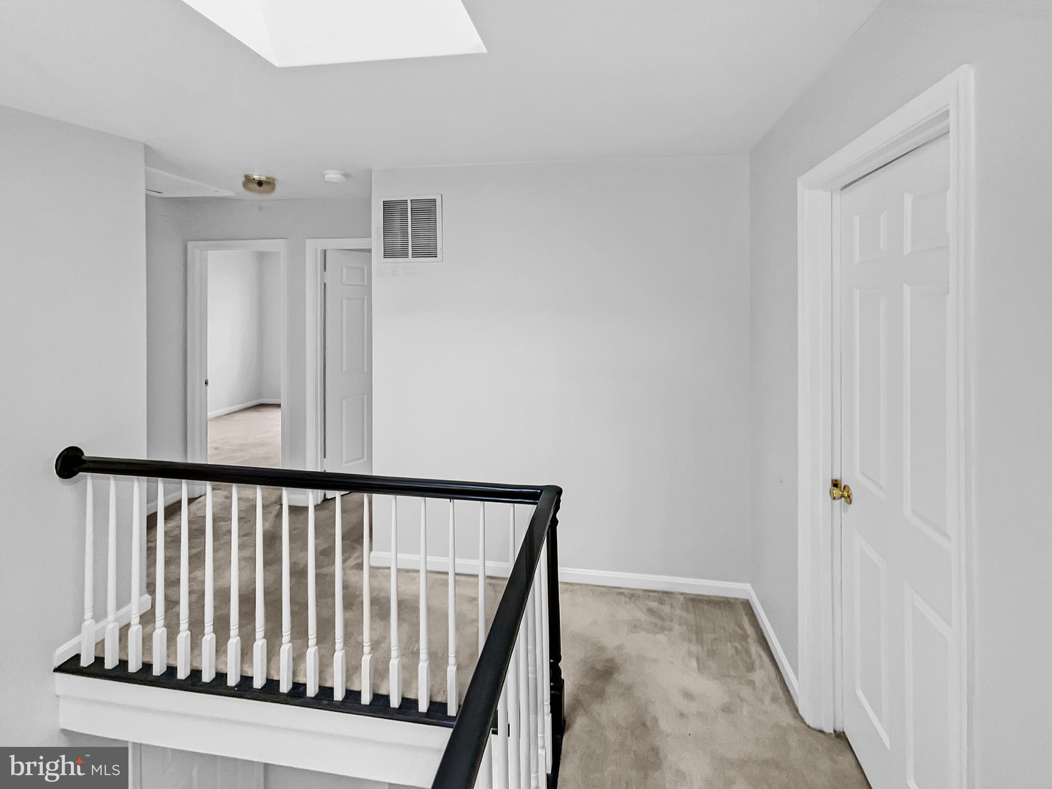 1624 Hiddenbrook Drive Herndon, VA 20170 - Photo 24 of 58 a view of a hallway with staircase