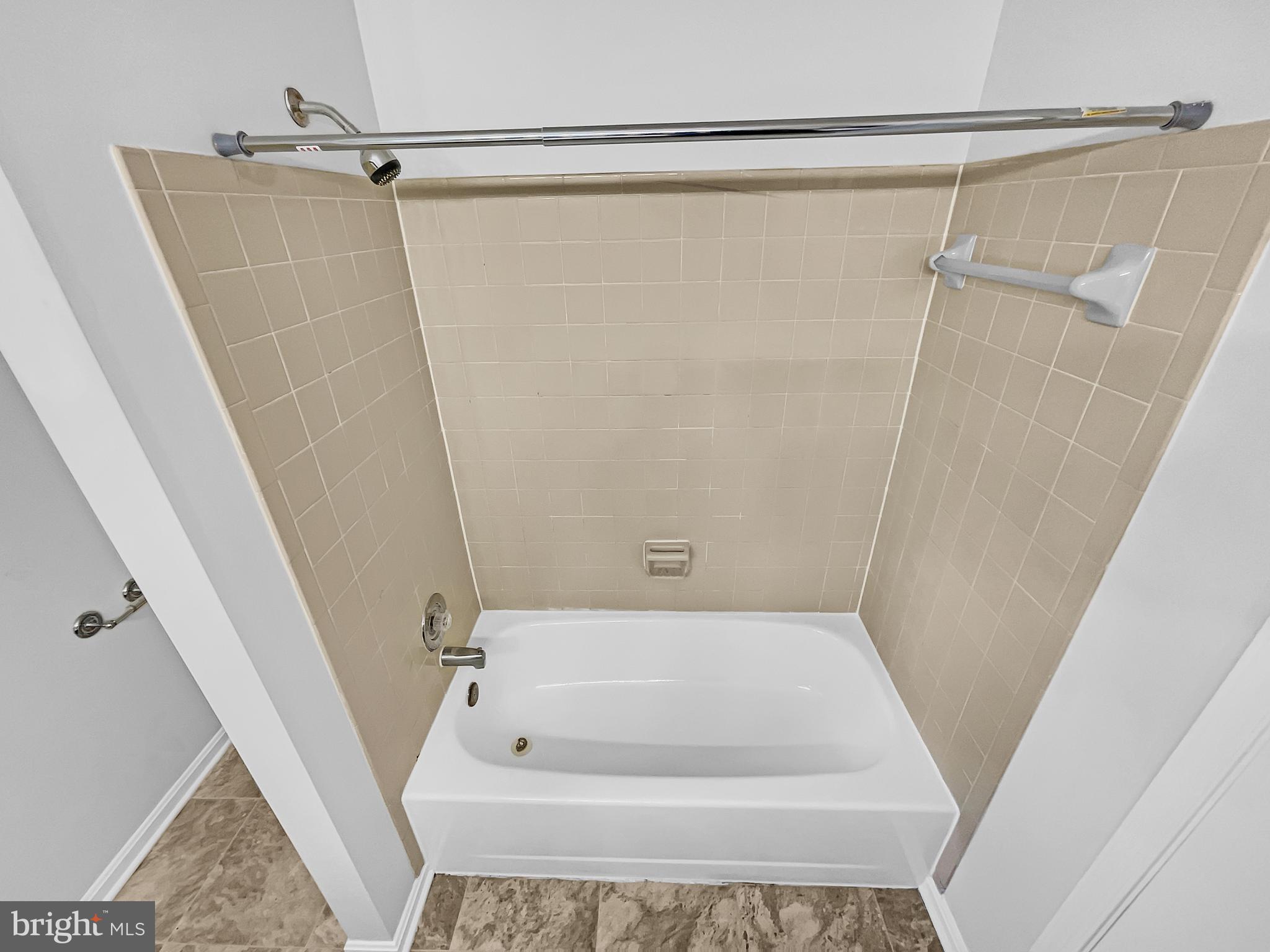 1624 Hiddenbrook Drive Herndon, VA 20170 - Photo 28 of 58 a bathroom with a shower and a bath tub