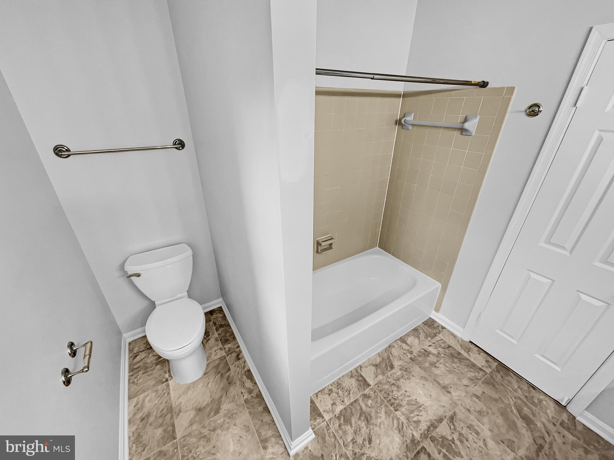 1624 Hiddenbrook Drive Herndon, VA 20170 - Photo 29 of 58 a bathroom with a toilet and a shower