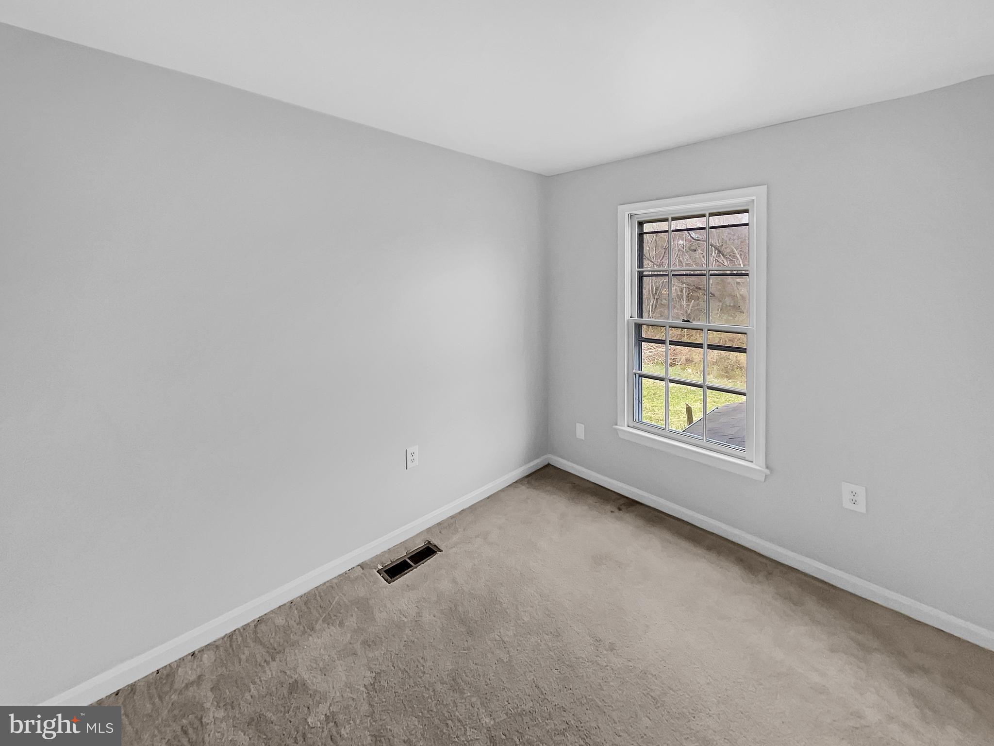 1624 Hiddenbrook Drive Herndon, VA 20170 - Photo 35 of 58 an empty room with windows