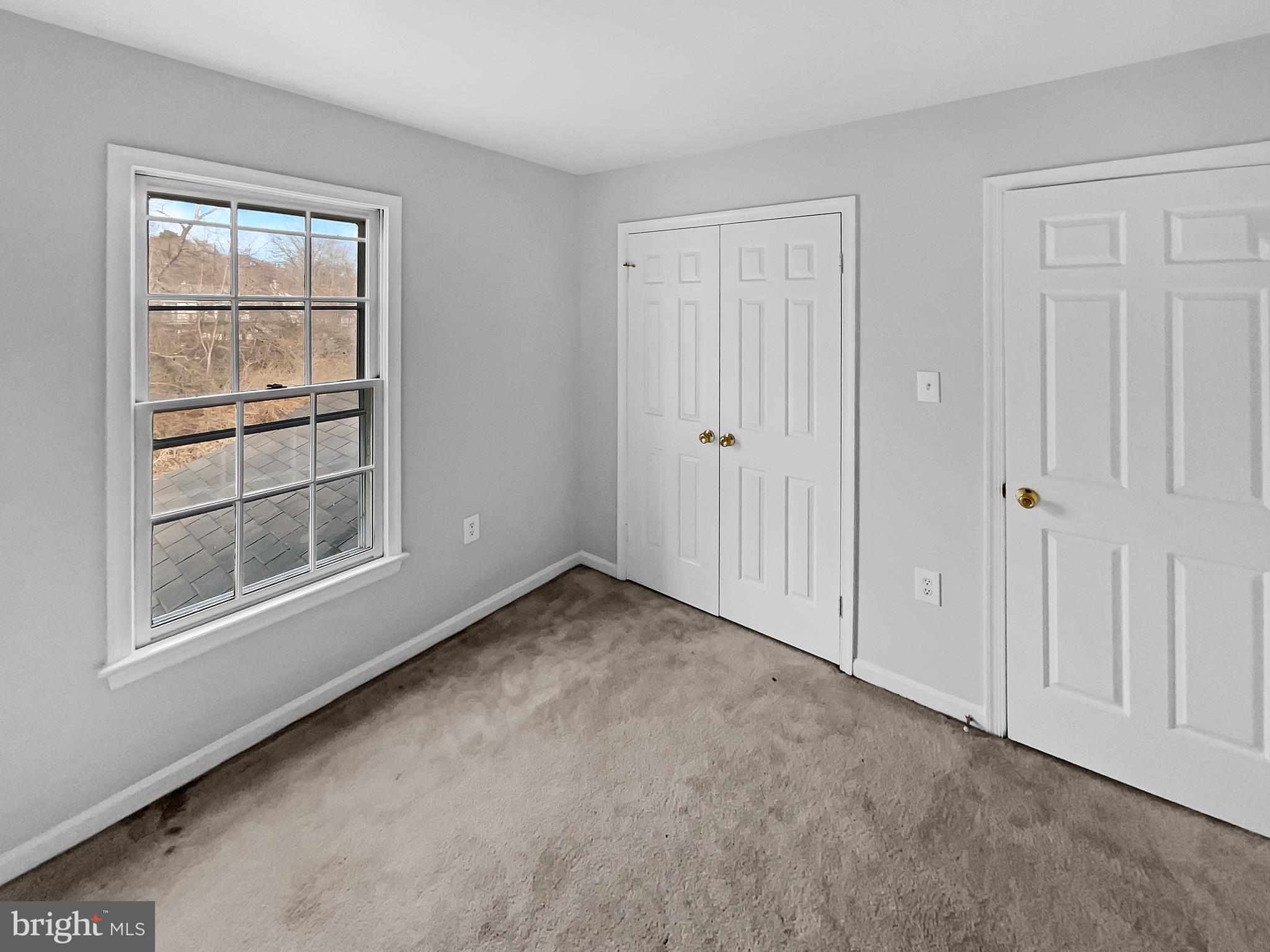 1624 Hiddenbrook Drive Herndon, VA 20170 - Photo 36 of 58 a view of an empty room with a window