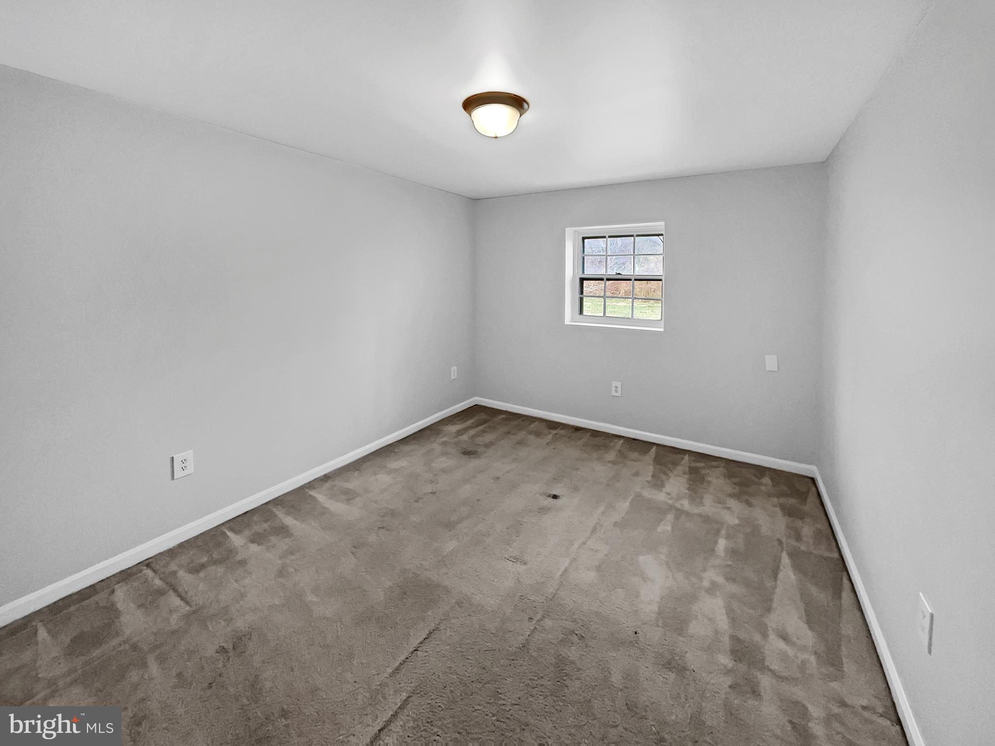 1624 Hiddenbrook Drive Herndon, VA 20170 - Photo 38 of 58 an empty room with a window