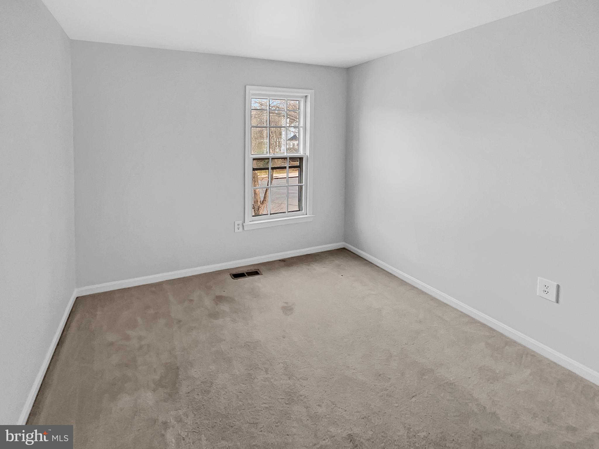 1624 Hiddenbrook Drive Herndon, VA 20170 - Photo 5 of 58 an empty room with a window