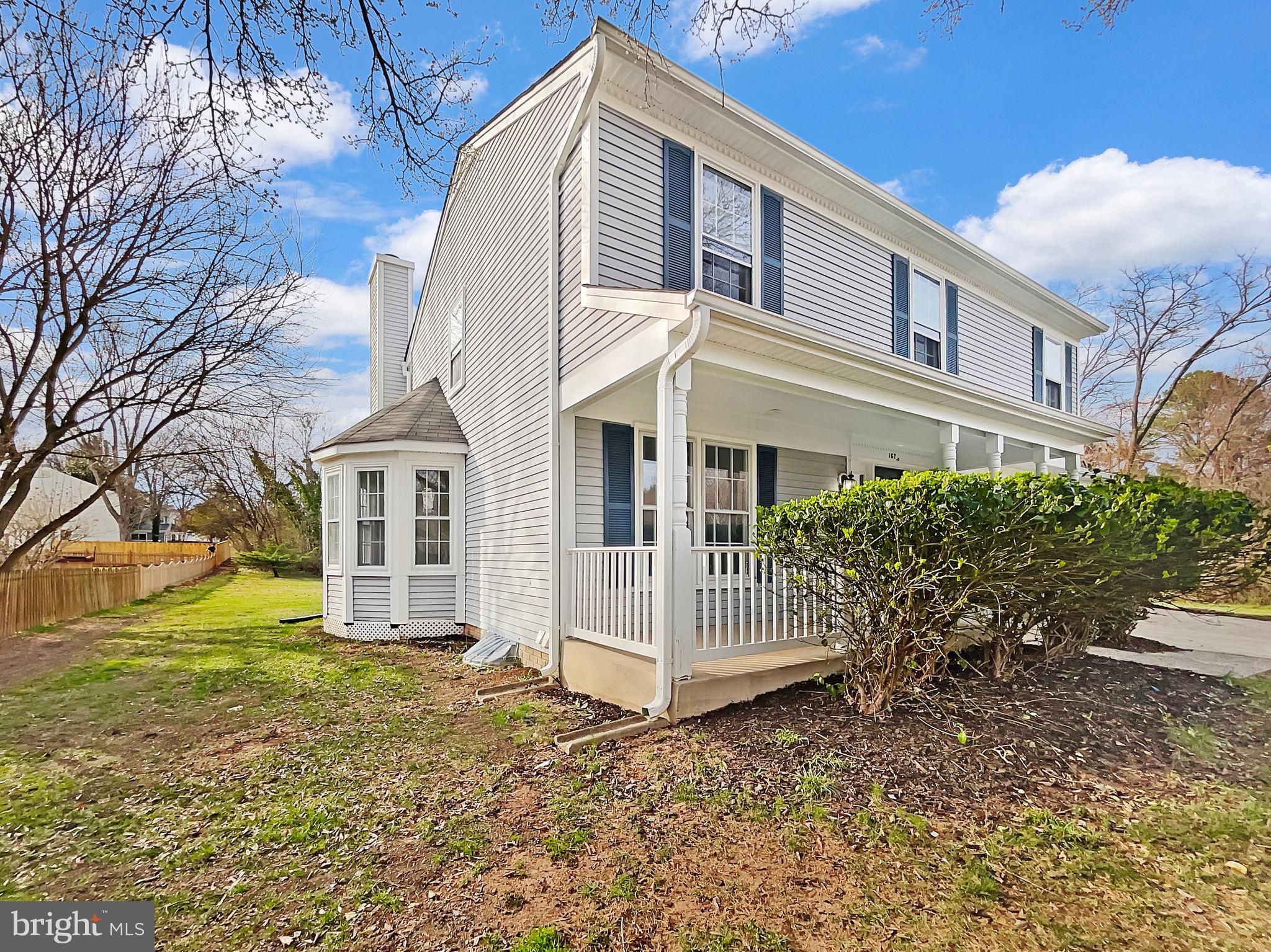 1624 Hiddenbrook Drive Herndon, VA 20170 - Photo 53 of 58 a view of a house with a yard