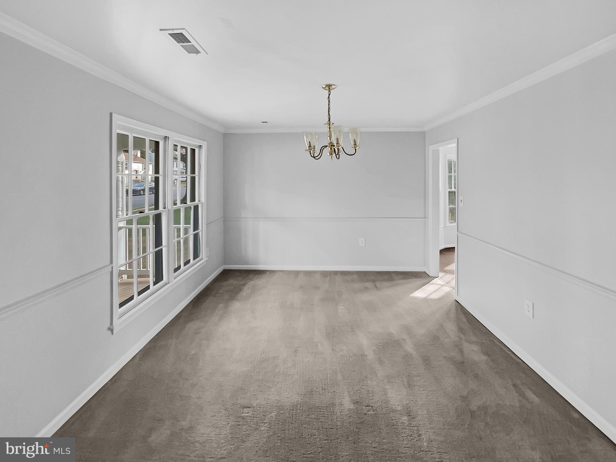 1624 Hiddenbrook Drive Herndon, VA 20170 - Photo 10 of 58 a view of an empty room with a window