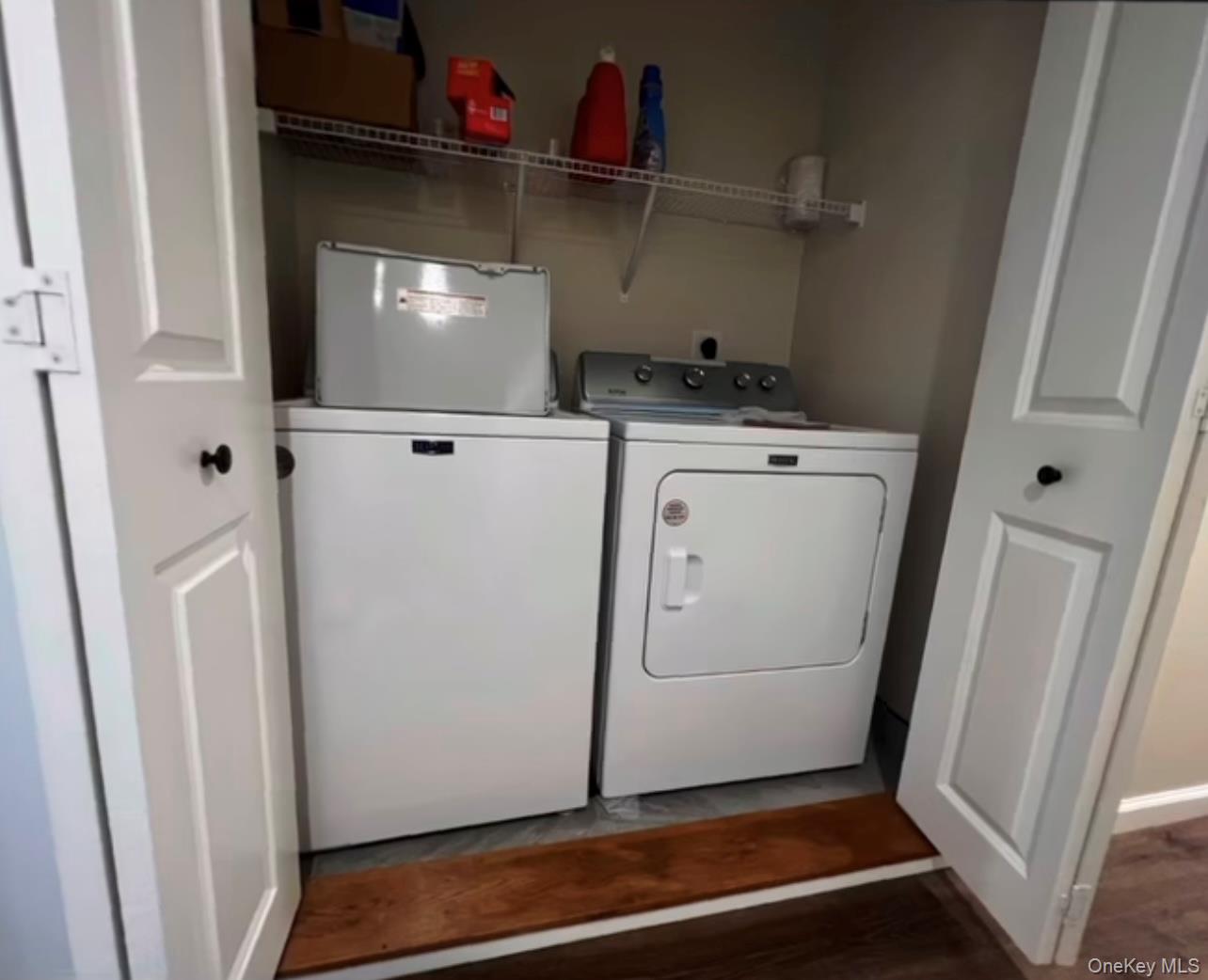 118 Plains Road, Unit 2 Walden, NY 12586 - Photo 11 of 15 a view of storage and utility room with washer and dryer