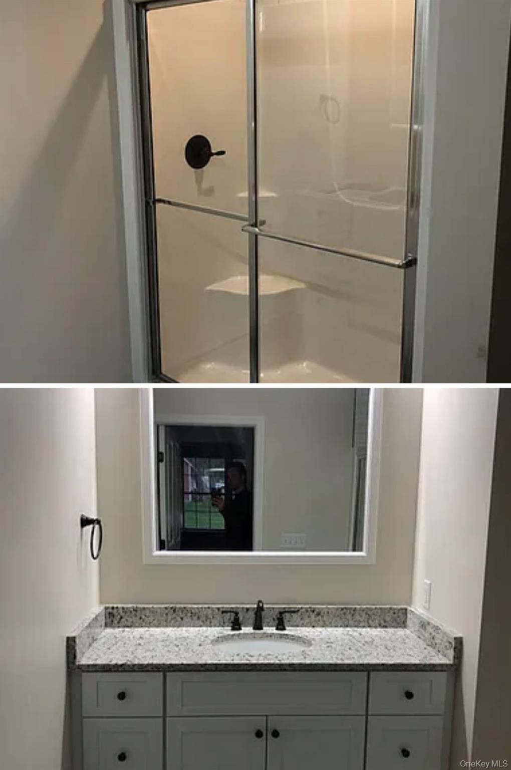 118 Plains Road, Unit 2 Walden, NY 12586 - Photo 13 of 15 a bathroom with a sink and mirror