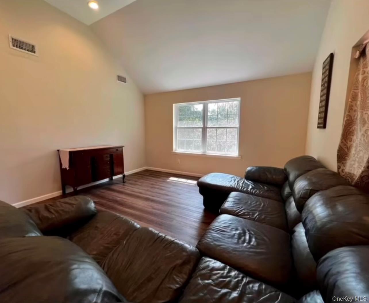 118 Plains Road, Unit 2 Walden, NY 12586 - Photo 4 of 15 a living room with furniture and a window