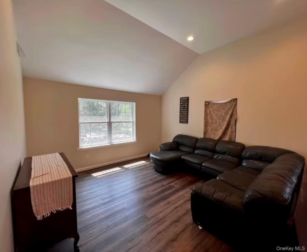 118 Plains Road, Unit 2 Walden, NY 12586 - Photo 5 of 15 a living room with furniture and a window