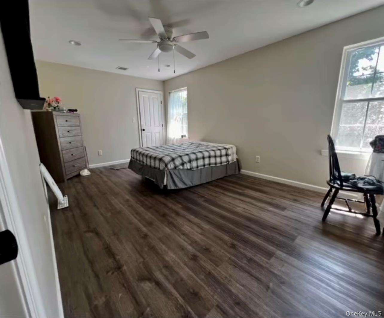 118 Plains Road, Unit 2 Walden, NY 12586 - Photo 7 of 15 a living room with furniture and a flat screen tv
