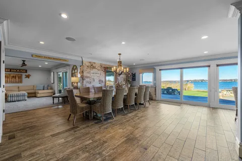 a view of a living room and dining room